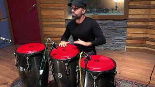 CONGAS MADE BY CARBONO INSTRUMENTS. PLAYED BY JORGE PEREZ.
